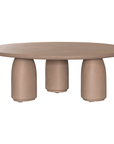 Lantara coffee table small in nomad dune finish with rounded top and three sculptural cylindrical legs.