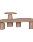 Lantara side table and large coffee table in nomad dune with tapered sculptural base and rounded top shown in a clean minimal setting.