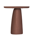 Lantara side table in a cinnabar clay finish with round top and elongated sculptural leg.