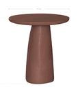 Lantara side table in a cinnabar clay finish with round top and elongated sculptural leg.