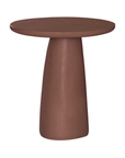 Lantara side table in a cinnabar clay finish with round top and elongated sculptural leg.