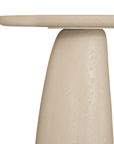 Lantara side table in driftstone finish with sculptural pedestal base and soft rounded top.