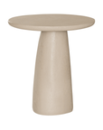 Lantara side table in driftstone finish with sculptural pedestal base and soft rounded top.