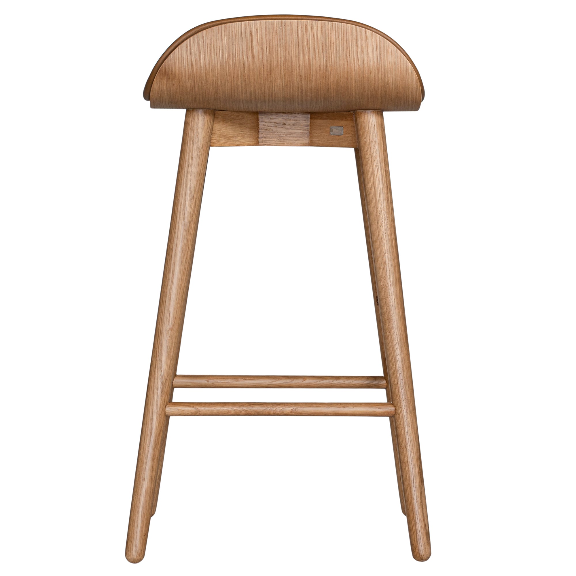 A stylish bar stool featuring a smooth tan leather seat and a sturdy natural oak frame. Designed with comfort and durability in mind, this contemporary stool is perfect for modern kitchens and dining spaces.