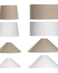 collection of linen lampshades in natural and white tones, featuring a variety of shapes including drum, cone, and tapered designs. Perfect for enhancing table lamps, floor lamps, and wall sconces with a soft, elegant touch