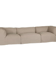 Natural linen modular sofa with plush upholstery, offering a relaxed and comfortable seating option for modern living spaces