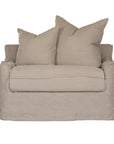 Natural linen one seater sofa with plush cushions, featuring a relaxed and stylish design for effortless comfort