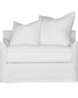 White linen one seater sofa with plush cushions, featuring a relaxed and stylish design for effortless comfort