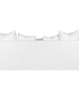 White linen three seater sofa with plush cushions, featuring a relaxed and stylish design for effortless comfort