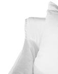 White linen three seater sofa with plush cushions, featuring a relaxed and stylish design for effortless comfort
