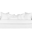 White linen three seater sofa with plush cushions, featuring a relaxed and stylish design for effortless comfort