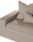Linen slipcover sectional sofa, designed for effortless comfort and relaxed elegance. Features a modular design with plush cushions and a timeless neutral hue