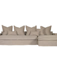 Linen slipcover sectional sofa, designed for effortless comfort and relaxed elegance. Features a modular design with plush cushions and a timeless neutral hue