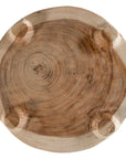 Lumara cheese plate in solid natural wood with round profile, visible timber grain and low pedestal feet.