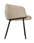 Lumo dining chair in bone with soft upholstered seat and curved backrest on slim black legs shown in a clean minimal setting.