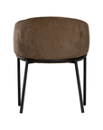 Lumo dining chair in cocoa with soft upholstered seat and curved backrest on slim black legs shown in a clean minimal setting.