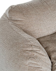 The Kulala Living luxe boucle bean bag in a soft natural hue, offering plush comfort with a stylish textured fabric. Designed for relaxation, this oversized bean bag creates a cosy, modern seating option for any living space
