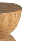 A sculptural solid magnesium oxide side table featuring an elegant hourglass silhouette with a natural wood grain finish. Perfect as a bedside table or accent piece in contemporary and coastal-inspired interiors