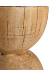 A sculptural solid magnesium oxide side table featuring an elegant hourglass silhouette with a natural wood grain finish. Perfect as a bedside table or accent piece in contemporary and coastal-inspired interiors