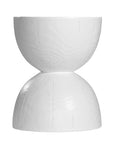 A sculptural solid magnesium oxide side table featuring an elegant hourglass silhouette with a natural wood grain finish. Perfect as a bedside table or accent piece in contemporary and coastal-inspired interiors