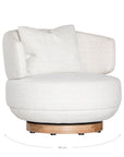 The Maja Occasional Chair from Kulala Living, a luxurious boucle swivel chair with a plush, rounded silhouette and a natural timber base, designed for both style and comfort in contemporary interiors