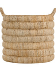 Mara natural handwoven storage basket with integrated handles in warm textured fibre set on a neutral background