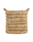 Mara natural handwoven storage basket with integrated handles in warm textured fibre set on a neutral background