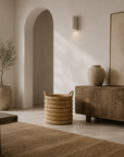 Mara Hand Woven Banana Leaf Basket brings natural texture and artisan character to a warm contemporary living room with organic styling and timeless appeal.