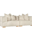 Contemporary modular sofa with a left and right armrest, upholstered in soft natural linen fabric, featuring plush cushions and sturdy wooden legs for a relaxed, sophisticated look