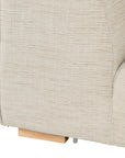 Contemporary modular sofa with a left armrest, upholstered in soft natural linen fabric, featuring plush cushions and sturdy wooden legs for a relaxed, sophisticated look