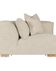 Contemporary modular sofa with a left armrest, upholstered in soft natural linen fabric, featuring plush cushions and sturdy wooden legs for a relaxed, sophisticated look