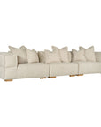 Contemporary modular sofa with a left and right armrest, upholstered in soft natural linen fabric, featuring plush cushions and sturdy wooden legs for a relaxed, sophisticated look