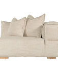 Contemporary modular sofa with a right armrest, upholstered in soft natural linen fabric, featuring plush cushions and sturdy wooden legs for a relaxed, sophisticated look