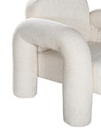 A modern sculptural armchair with rounded, chunky arms and backrest, upholstered in soft white boucle fabric, perfect for contemporary living spaces