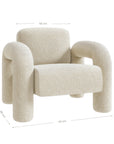 A modern sculptural armchair with rounded, chunky arms and backrest, upholstered in soft white boucle fabric, perfect for contemporary living spaces
