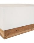 A contemporary white coffee table with a rustic wooden base, featuring a minimalist block design. This versatile piece blends modern aesthetics with organic textures, perfect for living spaces that embrace natural materials and clean lines