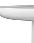 A contemporary white side table with a smooth, rounded top and a textured dome-shaped base, offering a modern and sculptural design