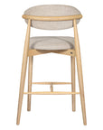 Contemporary wooden barstool with a natural timber frame and an upholstered seat and backrest in neutral fabric, blending comfort and style for modern interiors.