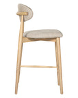 Contemporary wooden barstool with a natural timber frame and an upholstered seat and backrest in neutral fabric, blending comfort and style for modern interiors.