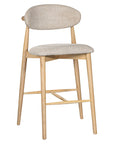 Contemporary wooden barstool with a natural timber frame and an upholstered seat and backrest in neutral fabric, blending comfort and style for modern interiors.g