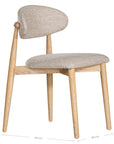 Contemporary wooden dining chair with a natural timber frame and an upholstered seat and backrest in neutral fabric, blending comfort and style for modern interiors.