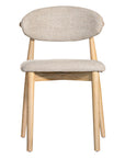 Contemporary wooden dining chair with a natural timber frame and an upholstered seat and backrest in neutral fabric, blending comfort and style for modern interiors.