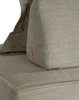 A versatile modular lounge chair in moss upholstery, designed for ultimate comfort with a deep seat and plush back cushion. Perfect for modern, relaxed interiors