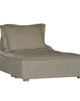 A versatile modular lounge chair in moss upholstery, designed for ultimate comfort with a deep seat and plush back cushion. Perfect for modern, relaxed interiors