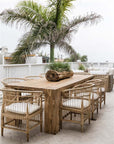Nakula rattan dining chairs styled around a timber outdoor table in a relaxed mediterranean inspired australian setting