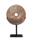 Natural carved teak disc sculpture with stand in modern minimalist design, perfect for adding bold decorative accents to any interior space