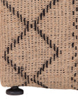 A natural handwoven bedhead featuring intricate geometric patterns, crafted from durable natural fibres for a timeless and earthy aesthetic.