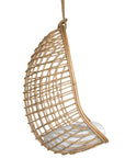A stylish natural hanging chair with an open-weave design, suspended by a natural rope and featuring a plush white cushion for ultimate relaxation