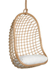 A stylish natural hanging chair with an open-weave design, suspended by a natural rope and featuring a plush white cushion for ultimate relaxation