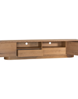 Natural oak TV unit featuring a sleek curved design with ample storage, including cabinets, a drawer, and an open shelf for media organisation